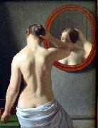 Woman Standing in Front of a Mirror